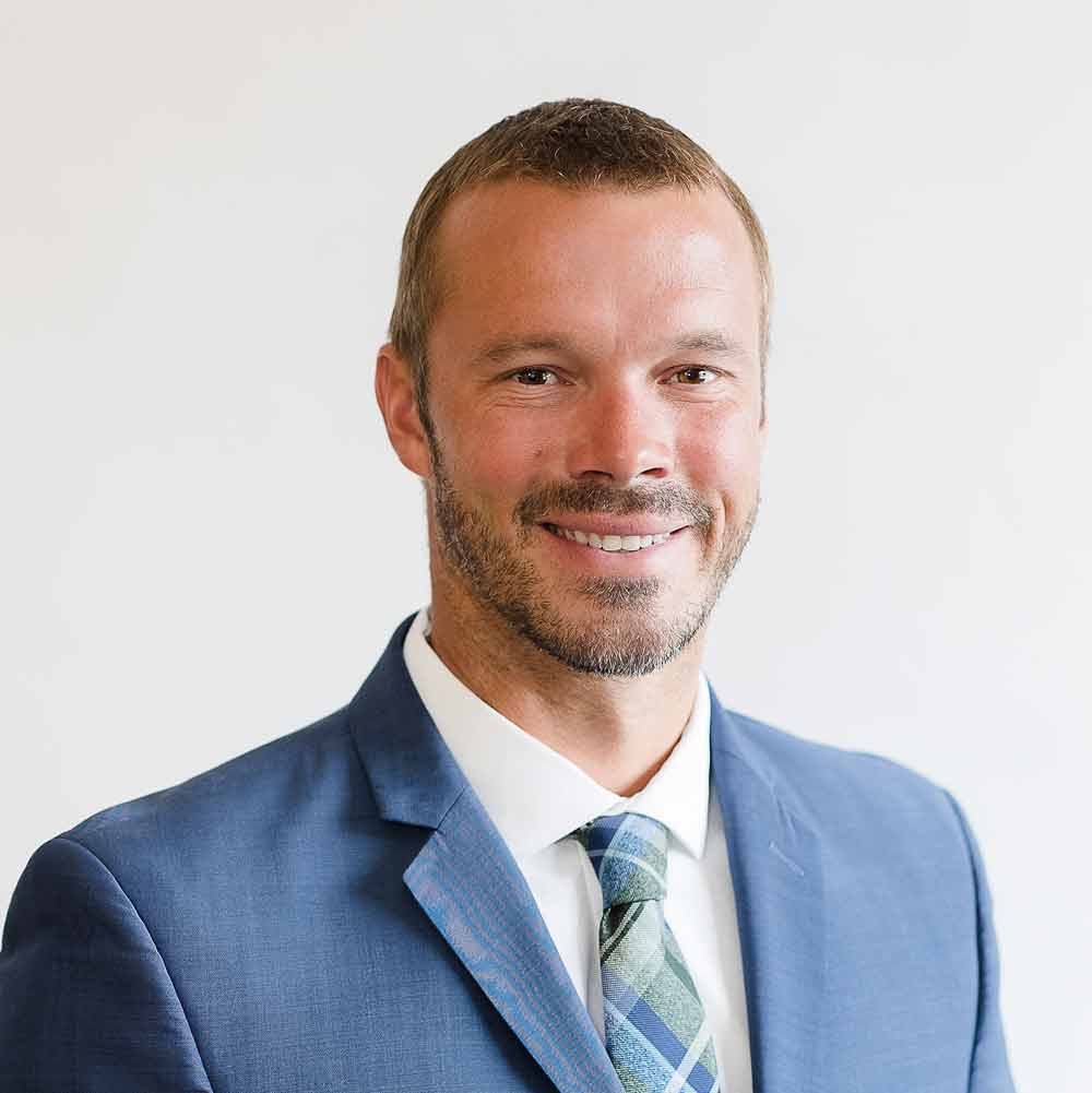 Adam J. Schrader